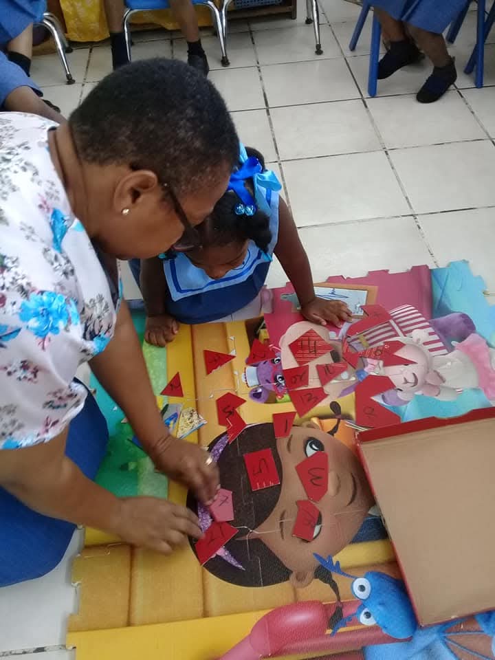 Teacher with student